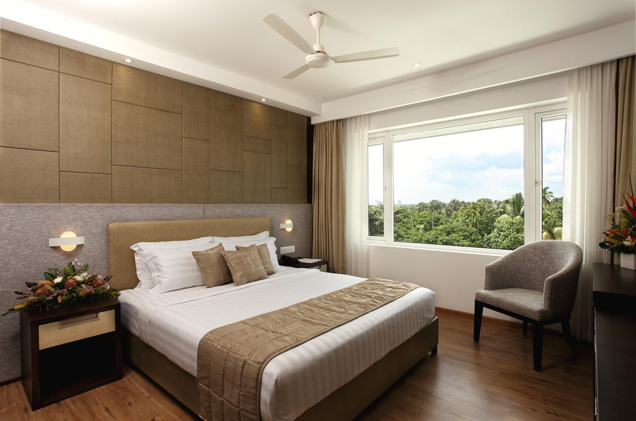 Sugar Business Hotel Kochi Екстер'єр фото