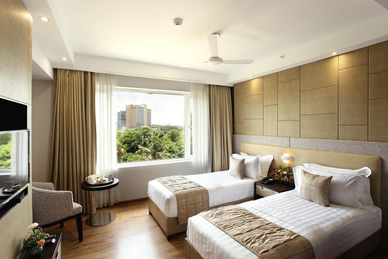 Sugar Business Hotel Kochi Екстер'єр фото