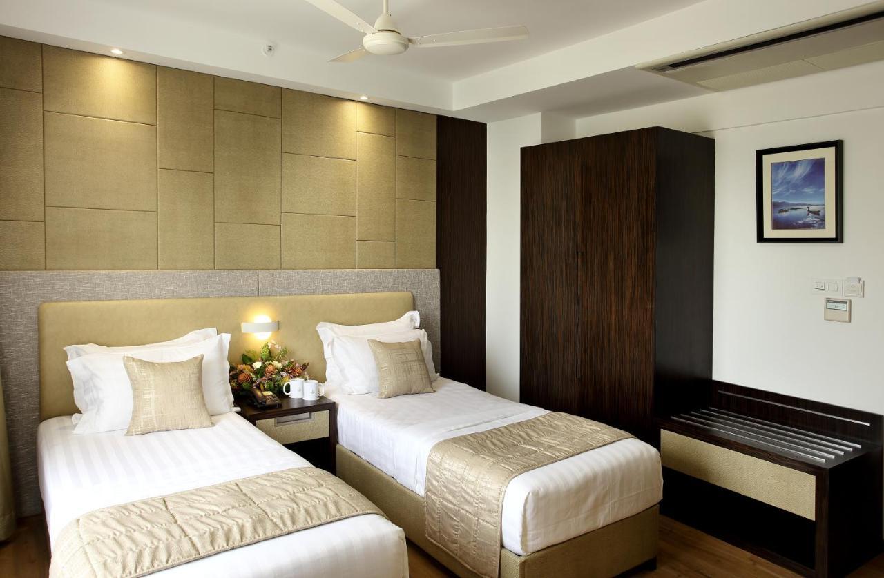 Sugar Business Hotel Kochi Екстер'єр фото
